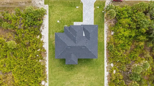 view of a house with a yard