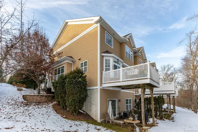 a front view of a building with street view