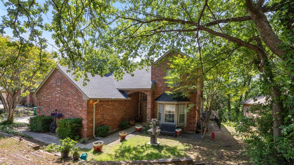 1508 Valley Creek Road Denton, TX 76205 - Photo 1 of 33 a view of backyard of the house