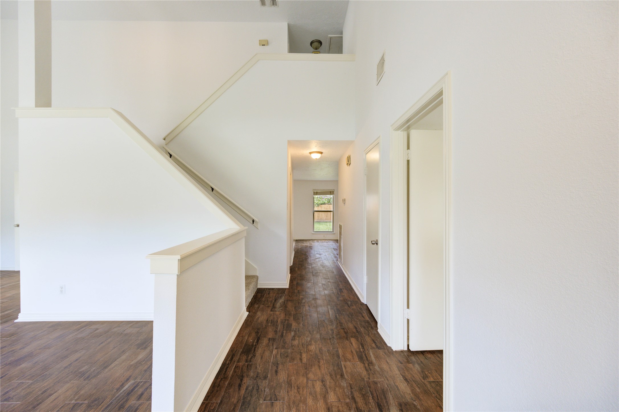 3639 Fir Forest Drive Spring, TX 77388 - Photo 7 of 44 a view of a hallway with wooden floor