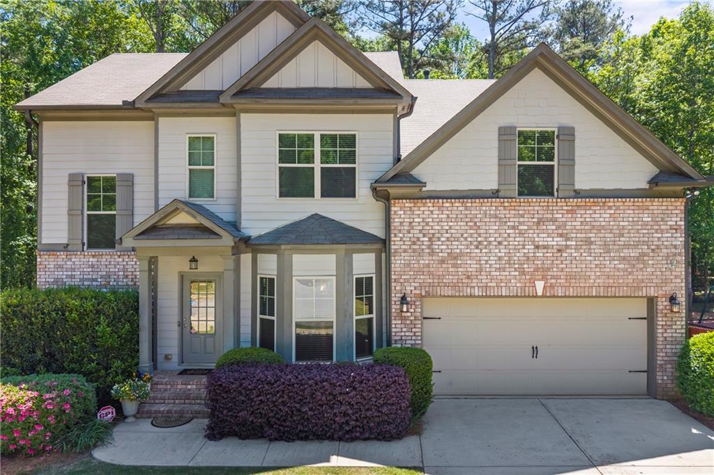 816 Mimosa Way Jefferson, GA 30549 - Photo 5 of 83 a front view of a house with garden