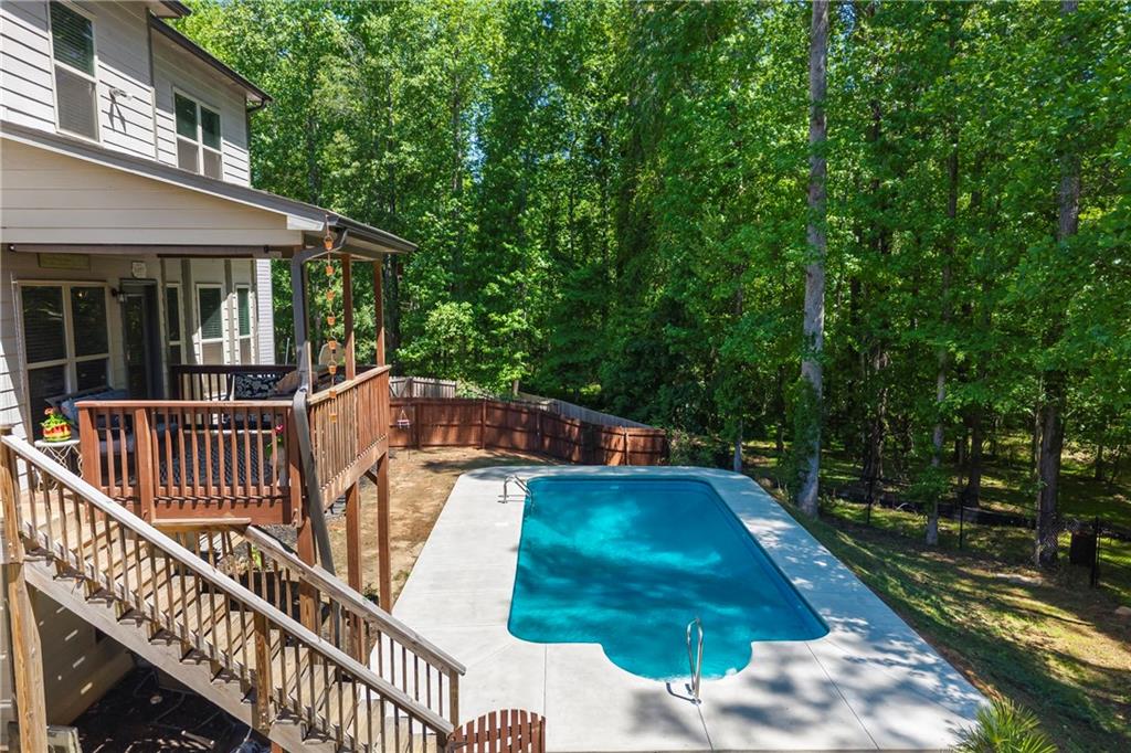 816 Mimosa Way Jefferson, GA 30549 - Photo 69 of 83 a view of balcony with deck and wooden floor
