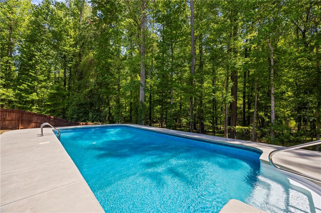 816 Mimosa Way Jefferson, GA 30549 - Photo 71 of 83 a view of a backyard with large trees