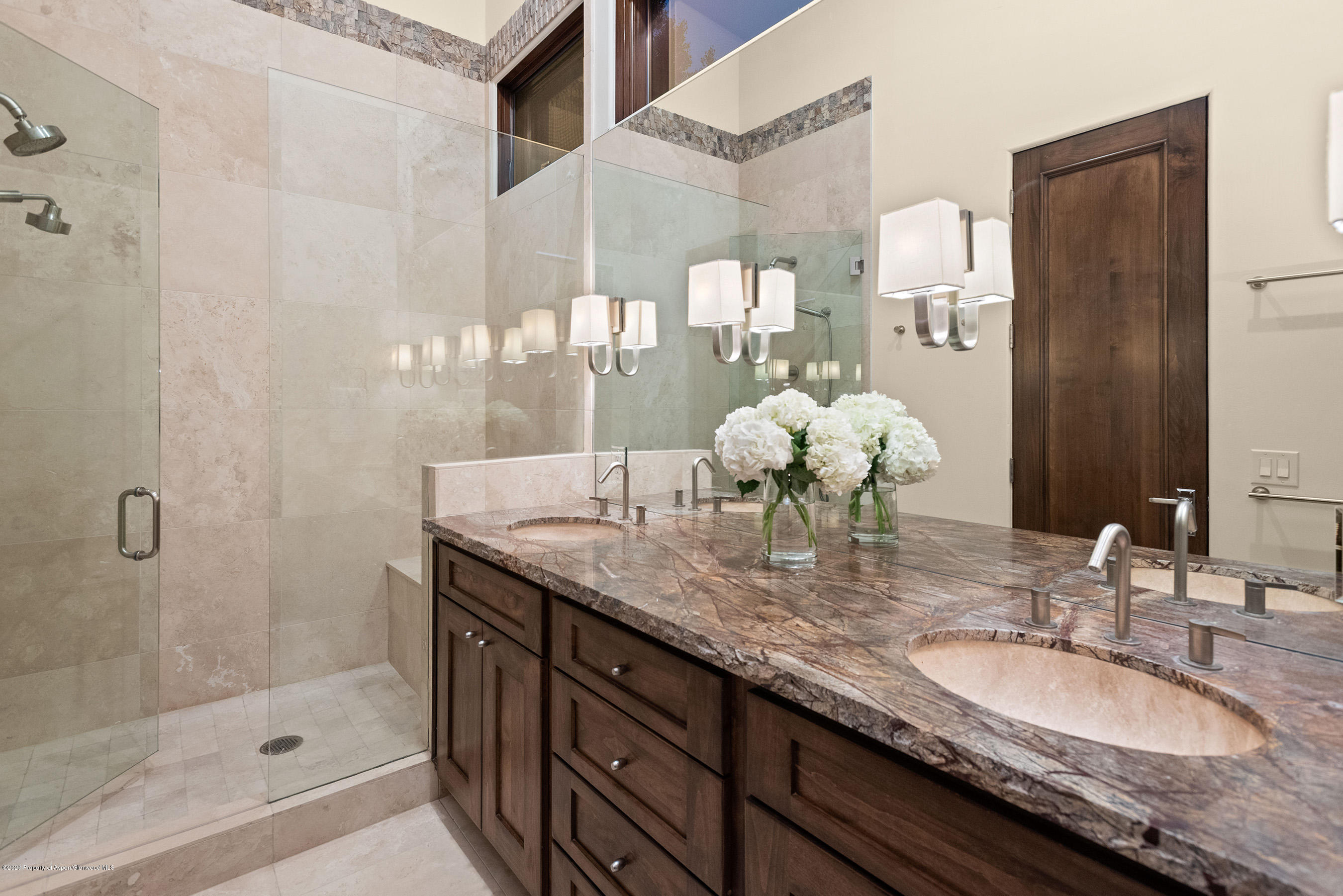 138 West Lupine Drive Aspen, CO 81611 - Photo 17 of 24 a bathroom with a granite countertop double vanity and a mirror