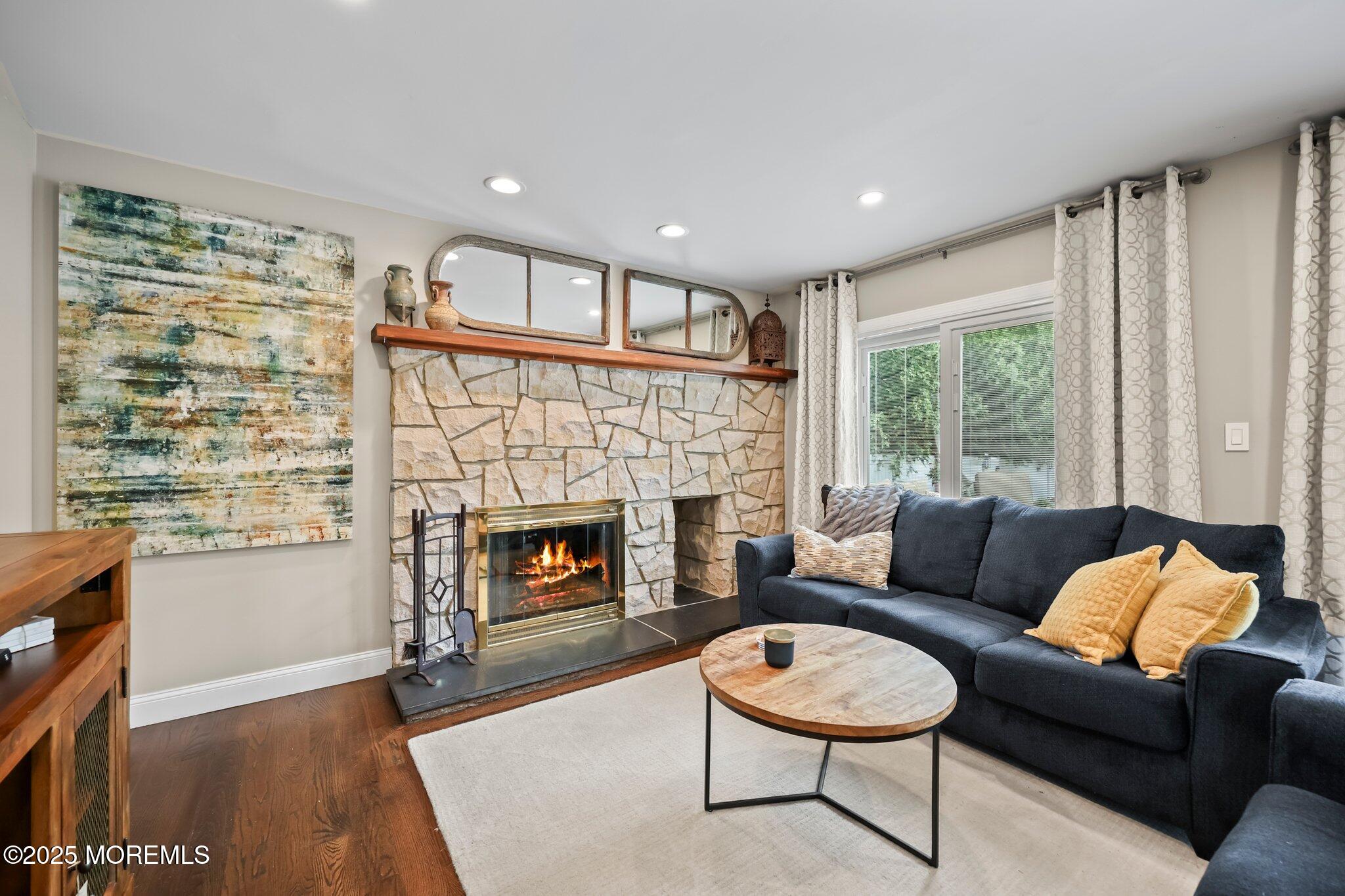 2 Independence Drive Aberdeen, NJ 07747 - Photo 11 of 43 a living room with furniture and a fireplace