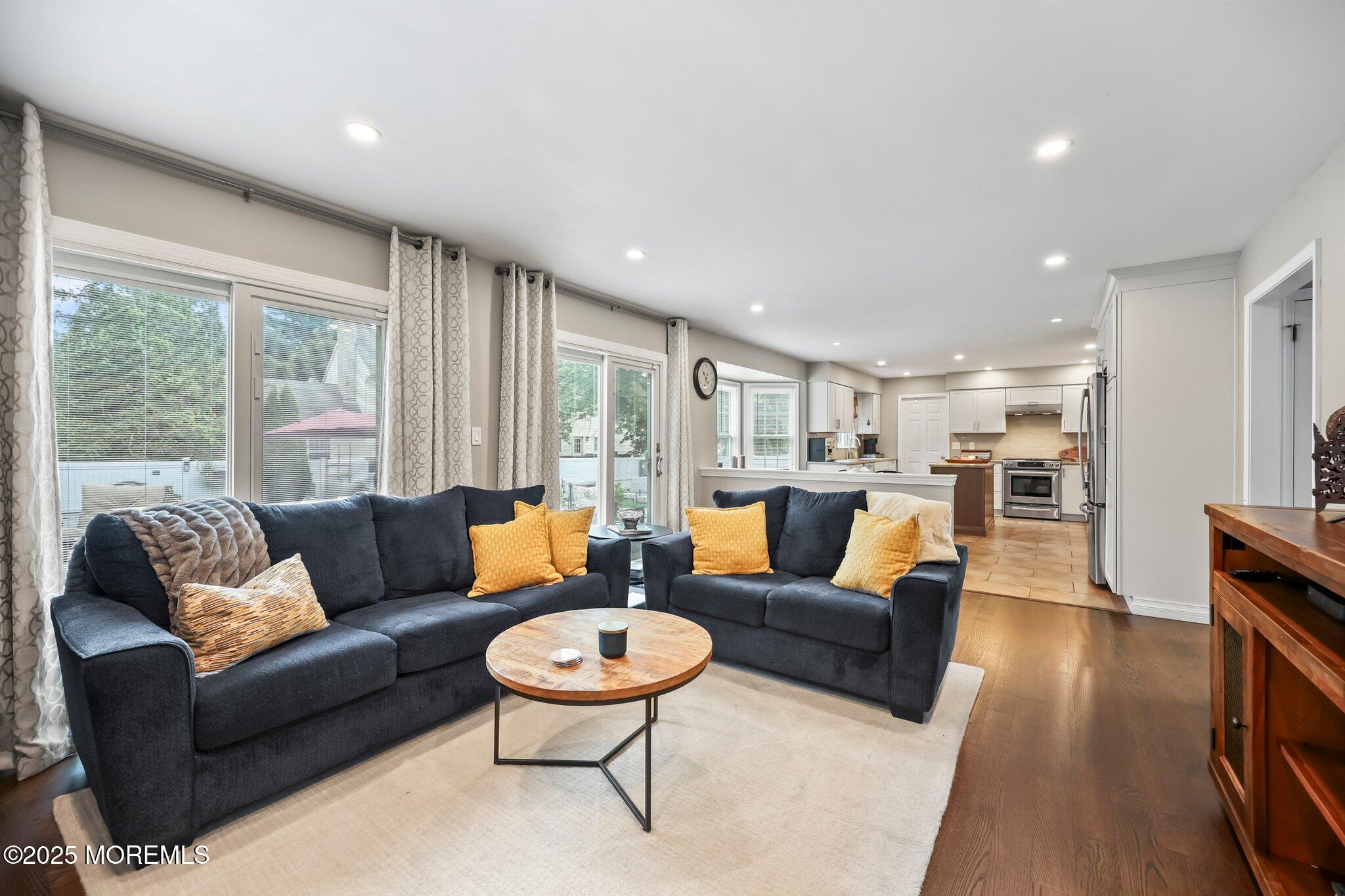 2 Independence Drive Aberdeen, NJ 07747 - Photo 12 of 43 a living room with furniture and a large window