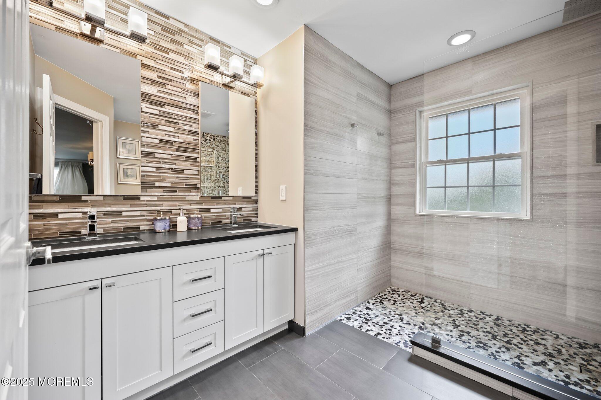 2 Independence Drive Aberdeen, NJ 07747 - Photo 36 of 43 a bathroom with a sink and a mirror