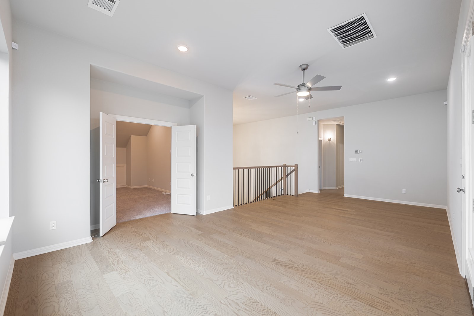 105 Bull Rdg Trail Georgetown, TX 78628 - Photo 25 of 36 a view of an empty room with a ceiling fan