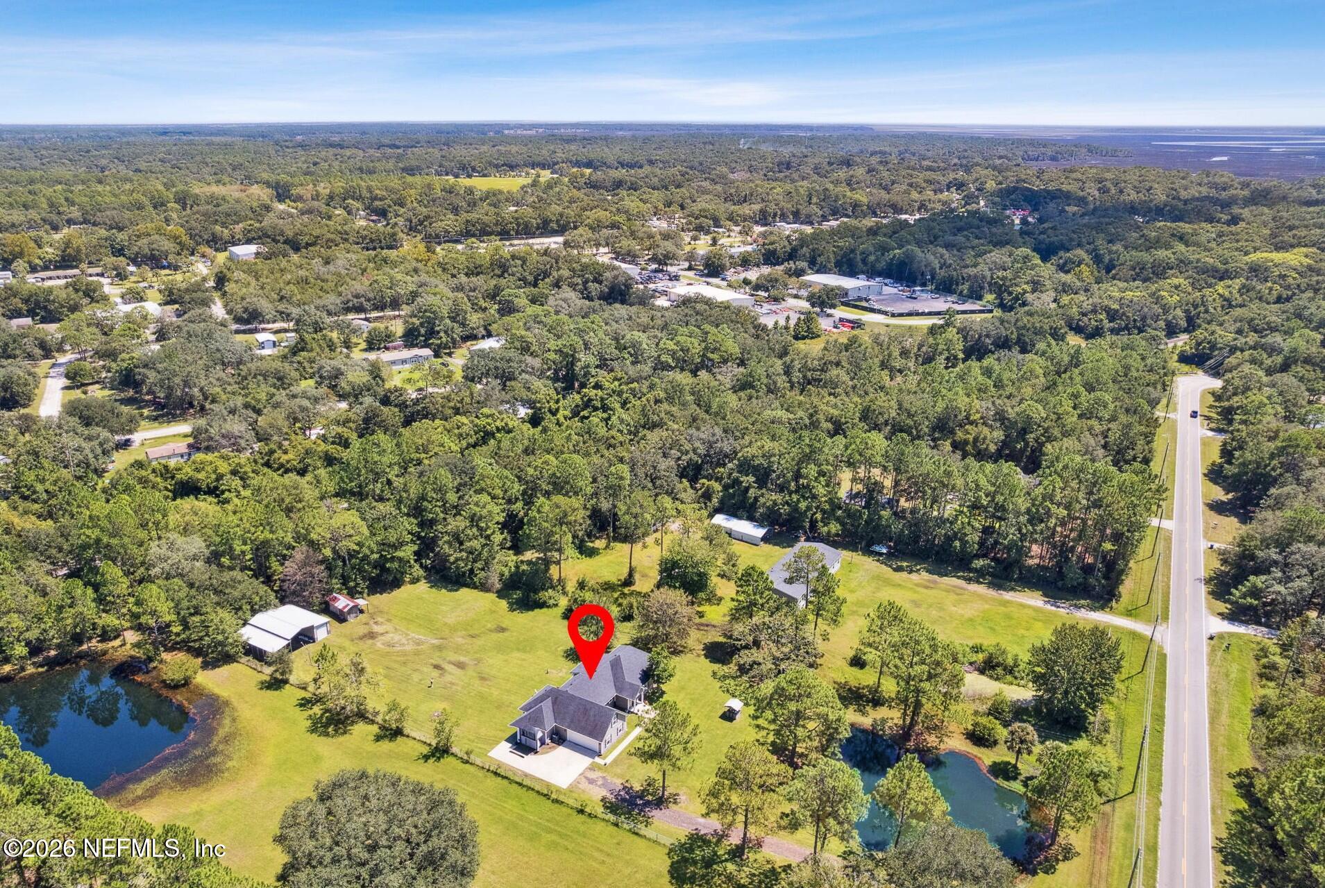 85456 North Harts Road Yulee, FL 32097 - Photo 34 of 36 harts aerialpond