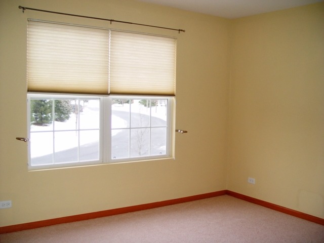 24136 Walnut Circle Plainfield, IL 60585 - Photo 13 of 17 an empty room with a window