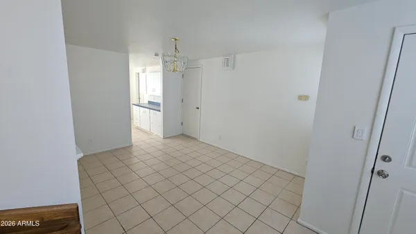 a view of a closet area in backyard