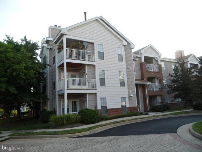 20963 Timber Ridge Terrace, Unit 303 Ashburn, VA 20147 - Photo 1 of 8 Exterior (Main)