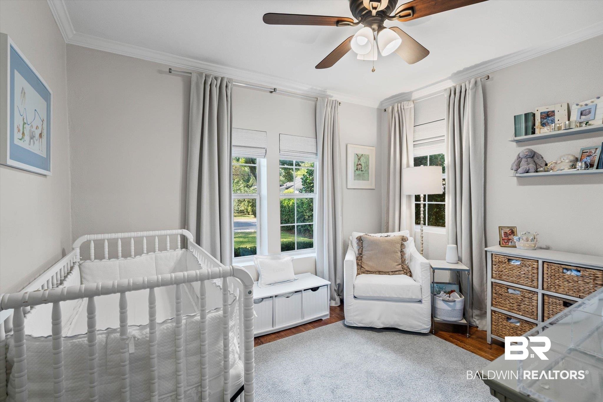 4310 The Cedars Avenue Mobile, AL 36608 - Photo 18 of 32 Bedroom featuring ornamental molding, wood finished floors, a nursery area, and a ceiling fan