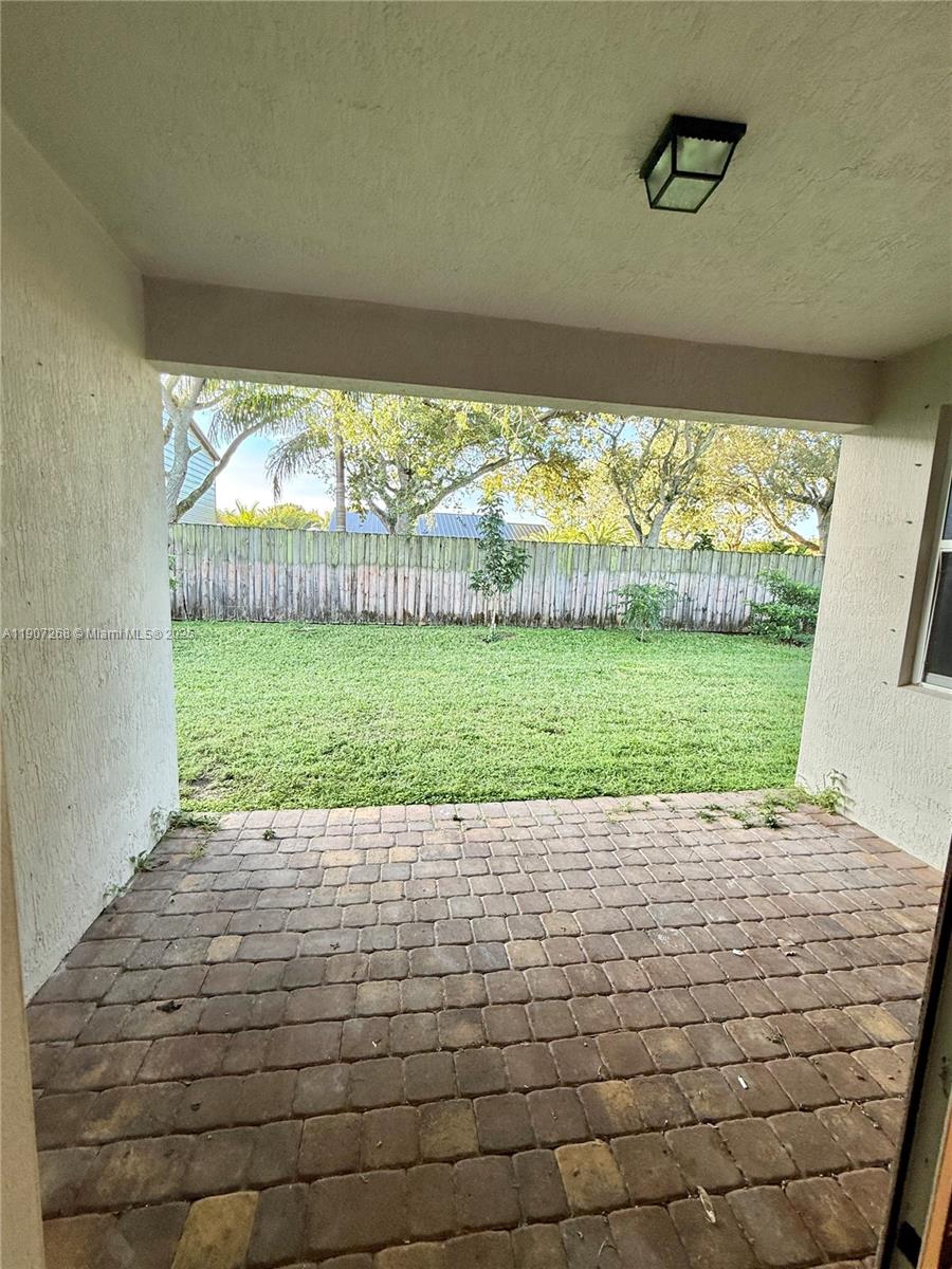 1740 Northwest 21st Street Homestead, FL 33030 - Photo 6 of 23 a view of a back yard of the house