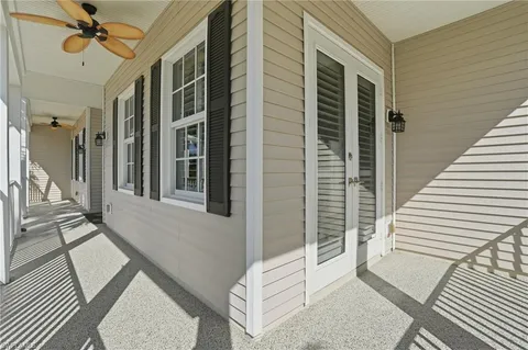 a view of a balcony with wooden floor and staircase