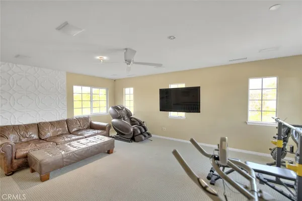 a room with a window and a chair