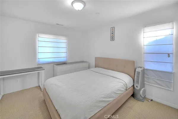 a view of a chairs and table in the patio