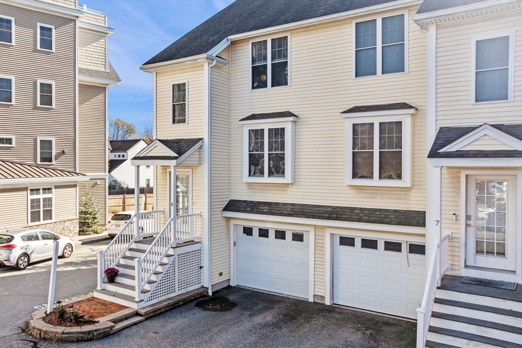 133 Eastern Avenue, Unit 8 Lynn, MA 01902 - Photo 34 of 38 a view of a house with a yard