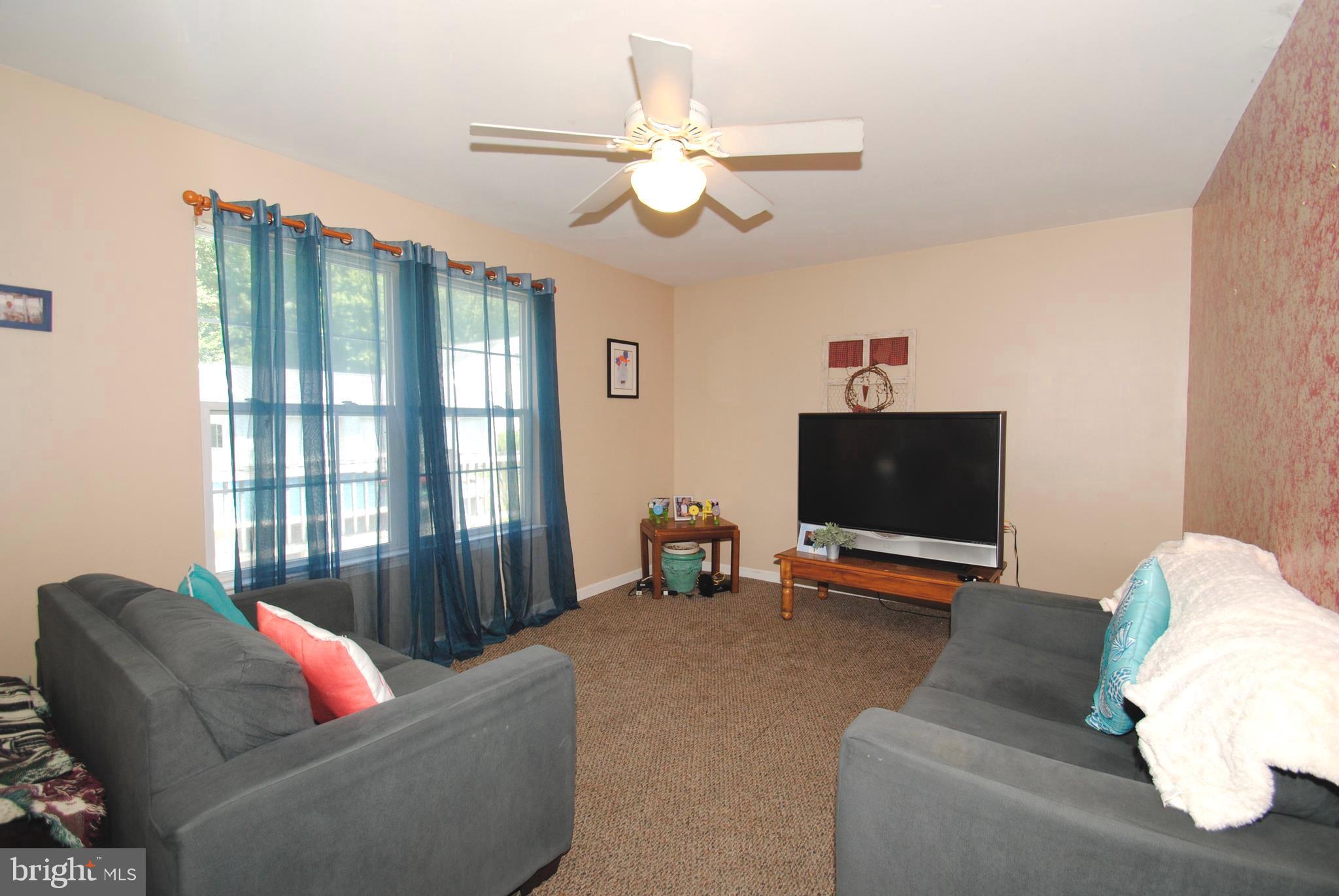 705 Ruthsburg Road Centreville, MD 21617 - Photo 7 of 24 WELL LIT LIVING ROOM