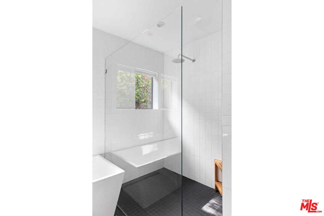 1101 Heatherside Road Pasadena, CA 91105 - Photo 16 of 44 a view of an empty room with wooden floor