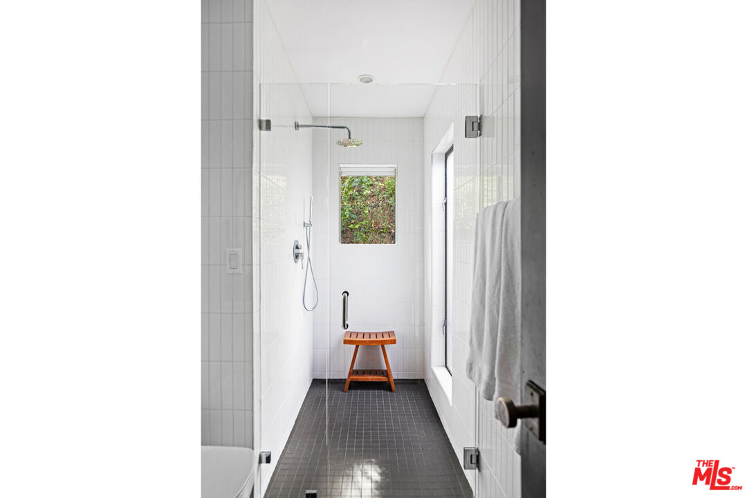 1101 Heatherside Road Pasadena, CA 91105 - Photo 20 of 44 a view of a hallway with a room and a yard