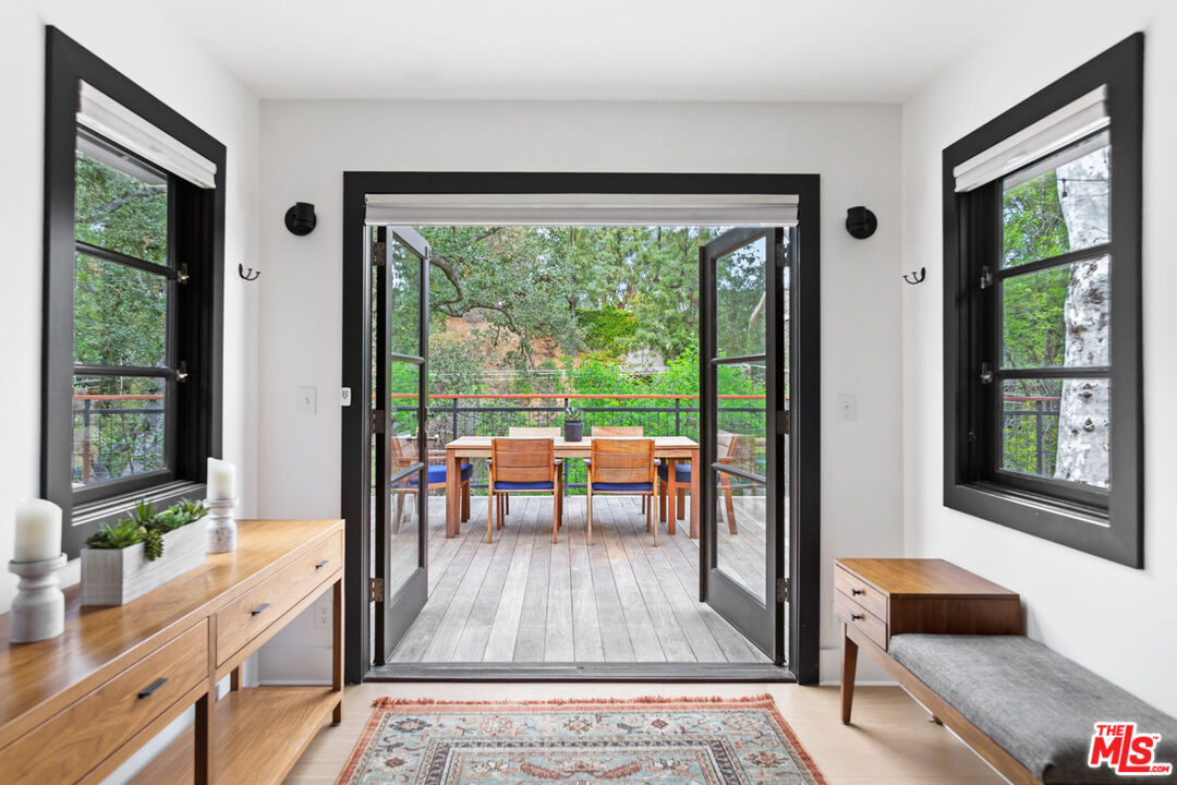 1101 Heatherside Road Pasadena, CA 91105 - Photo 24 of 44 a living room with furniture and a large window