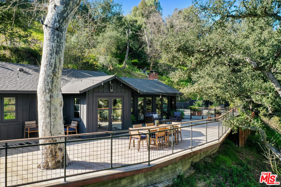 1101 Heatherside Road Pasadena, CA 91105 - Photo 3 of 44 a view of a house with pool and sitting area