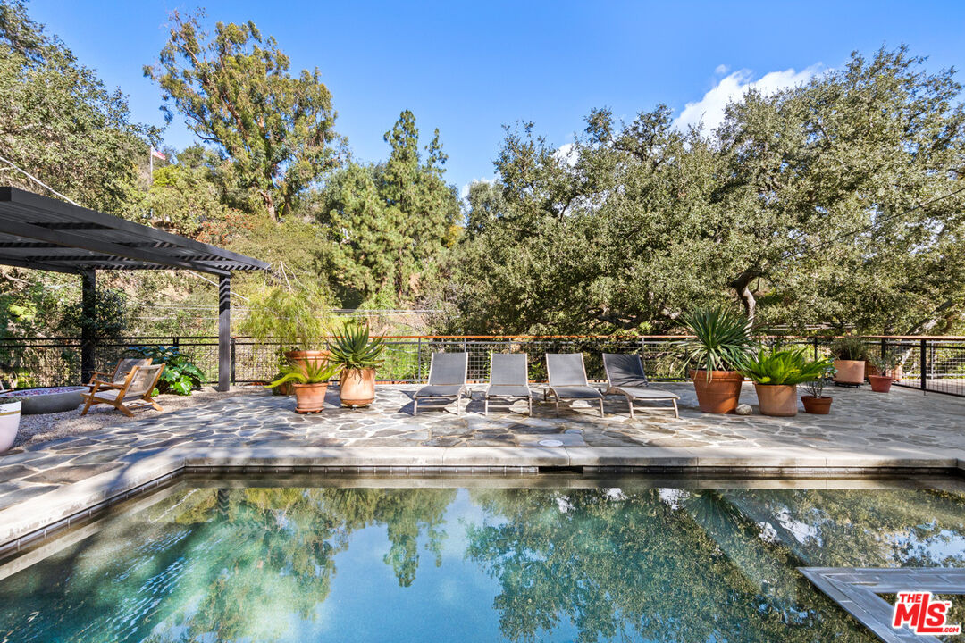 1101 Heatherside Road Pasadena, CA 91105 - Photo 31 of 44 a view of a house with pool and sitting area