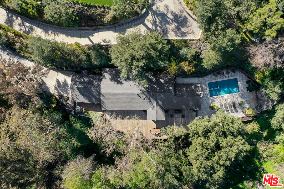 1101 Heatherside Road Pasadena, CA 91105 - Photo 35 of 44 an aerial view of a house with a yard and large trees