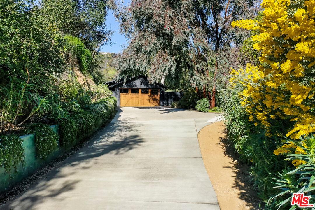 1101 Heatherside Road Pasadena, CA 91105 - Photo 36 of 44 a view of swimming pool with a patio