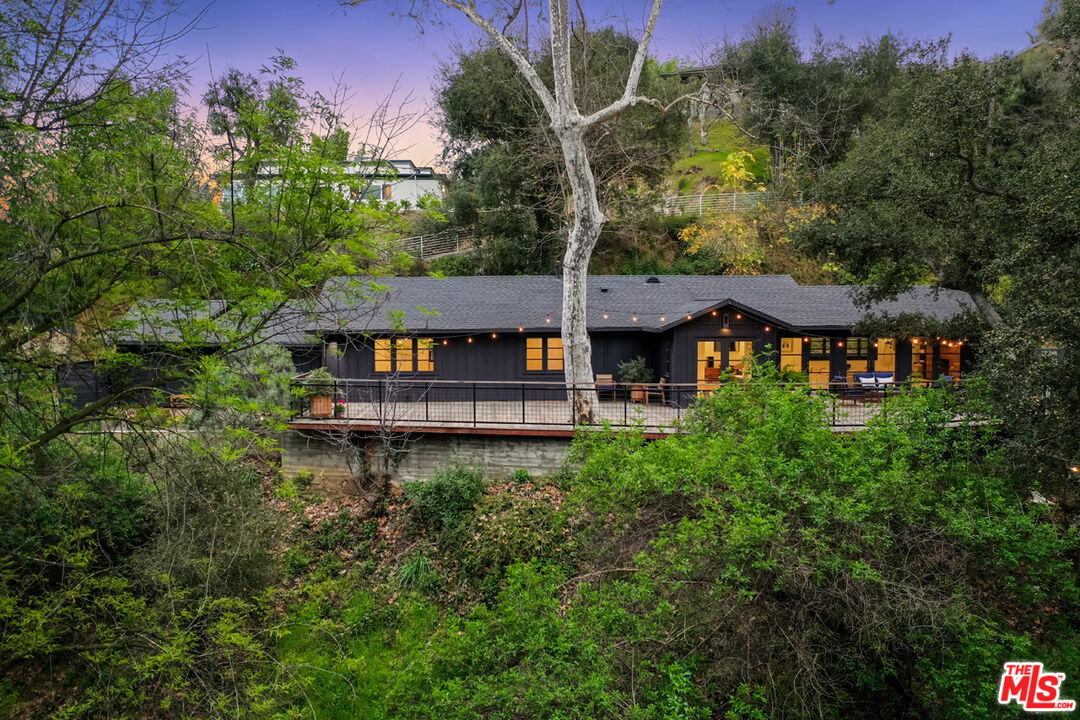 1101 Heatherside Road Pasadena, CA 91105 - Photo 37 of 44 an aerial view of a house with balcony and trees al around