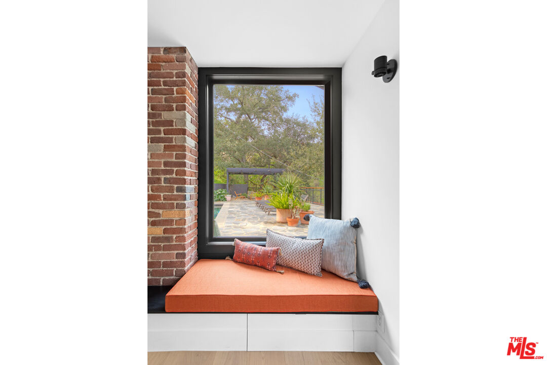 1101 Heatherside Road Pasadena, CA 91105 - Photo 5 of 44 a bedroom with a bed and a large window