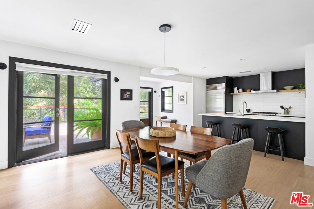 1101 Heatherside Road Pasadena, CA 91105 - Photo 7 of 44 a view of a dining room with furniture window and outside view