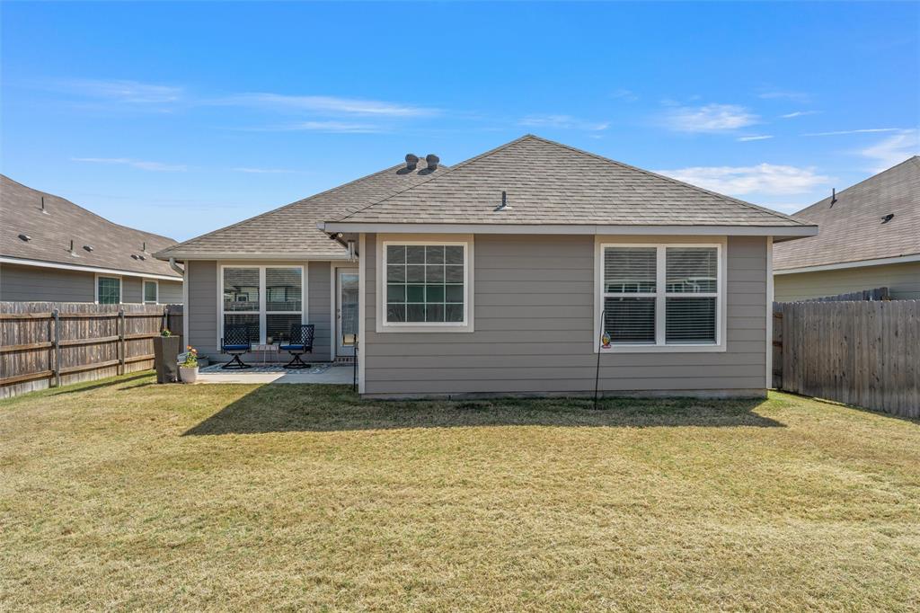 4056 Centerfire Road Waco, TX 76705 - Photo 25 of 27 a view of a house with a yard
