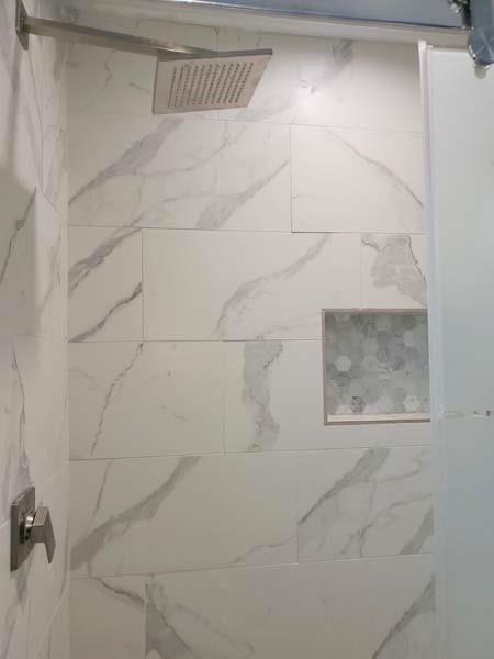 209 Campus Street Ferris, TX 75125 - Photo 16 of 33 a bathroom with a shower