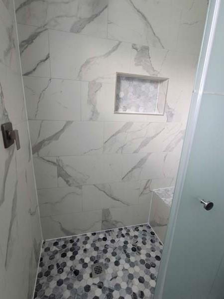 209 Campus Street Ferris, TX 75125 - Photo 28 of 33 a bathroom with a shower