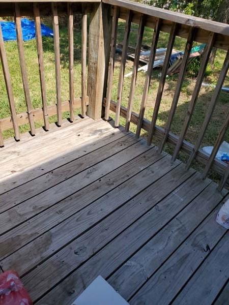 209 Campus Street Ferris, TX 75125 - Photo 32 of 33 a view of wooden floor and a floor to ceiling window