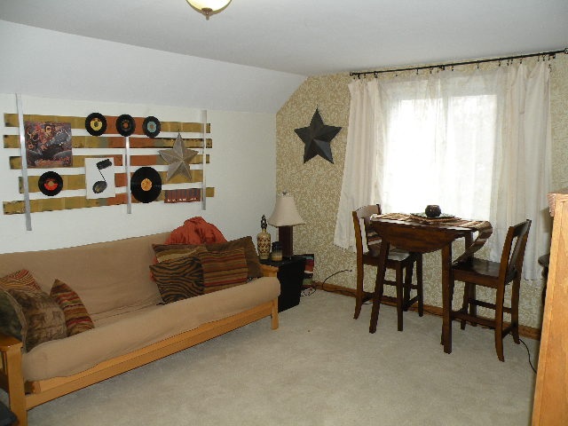 4201 West Bennington Road Owosso, MI 48867 - Photo 15 of 22 Second level area with kitchenette, eating area and 3rd bedroom