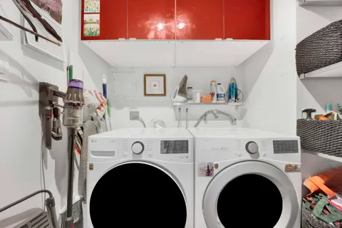 a view of washer and dryer in a utility room