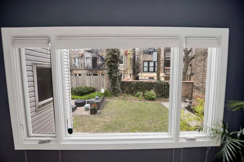 a view of a living room and a window