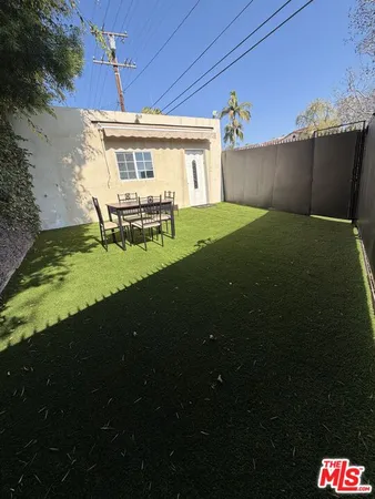 a house view with a garden space