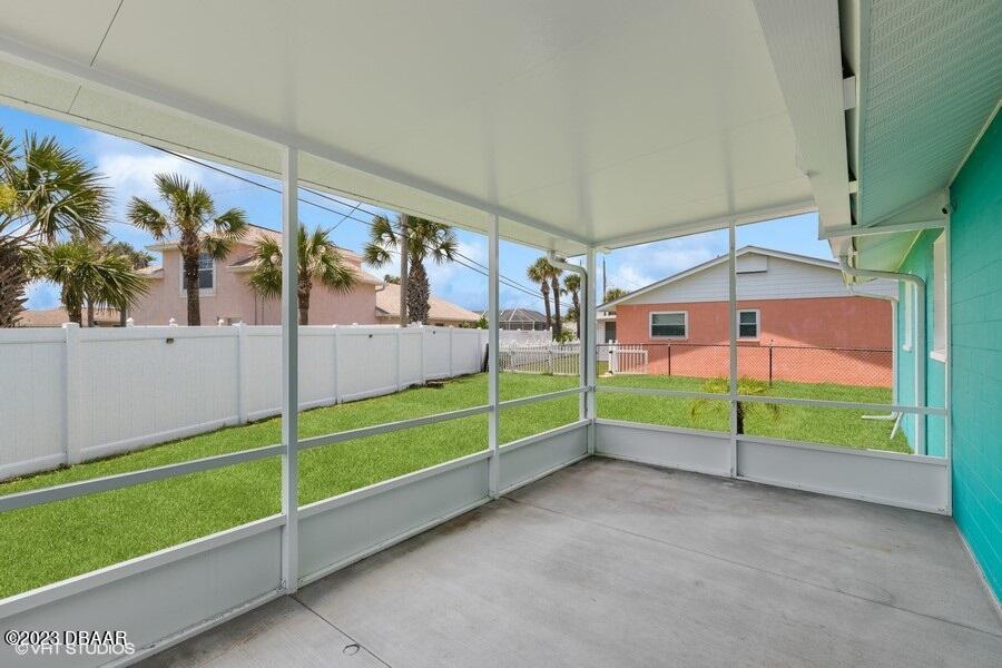 1 Ocean Breeze Circle Ormond Beach, FL 32176 - Photo 17 of 43 Screened Porch/Fenced Backyard