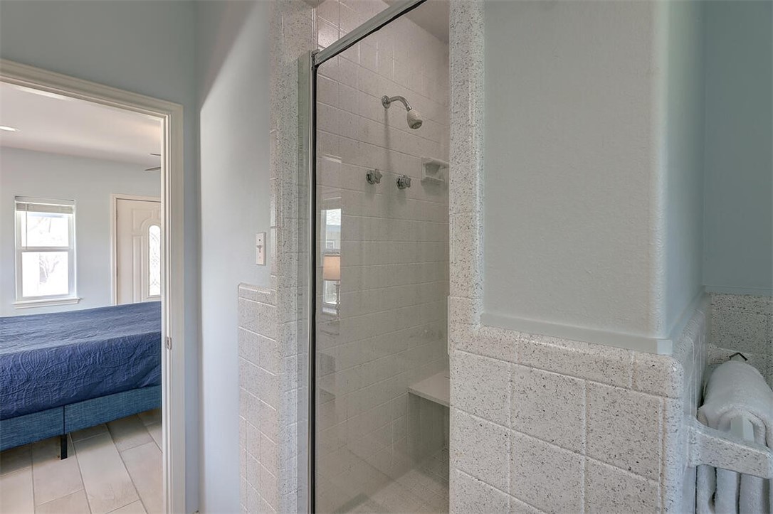 1010 1st Street Bayside, TX 78340 - Photo 28 of 40 a bathroom with a shower and a sink