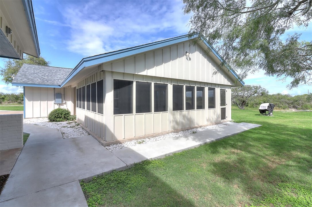 1010 1st Street Bayside, TX 78340 - Photo 34 of 40 a view of house with backyard and garden