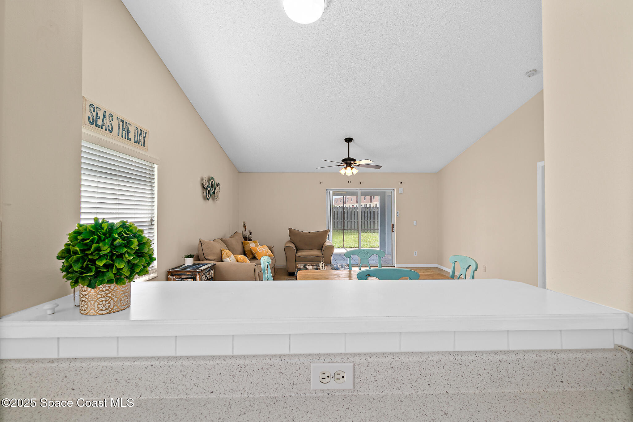 147-159 Ocean View Lane Melbourne, FL 32903 - Photo 15 of 48 a view of living room with furniture and flowers