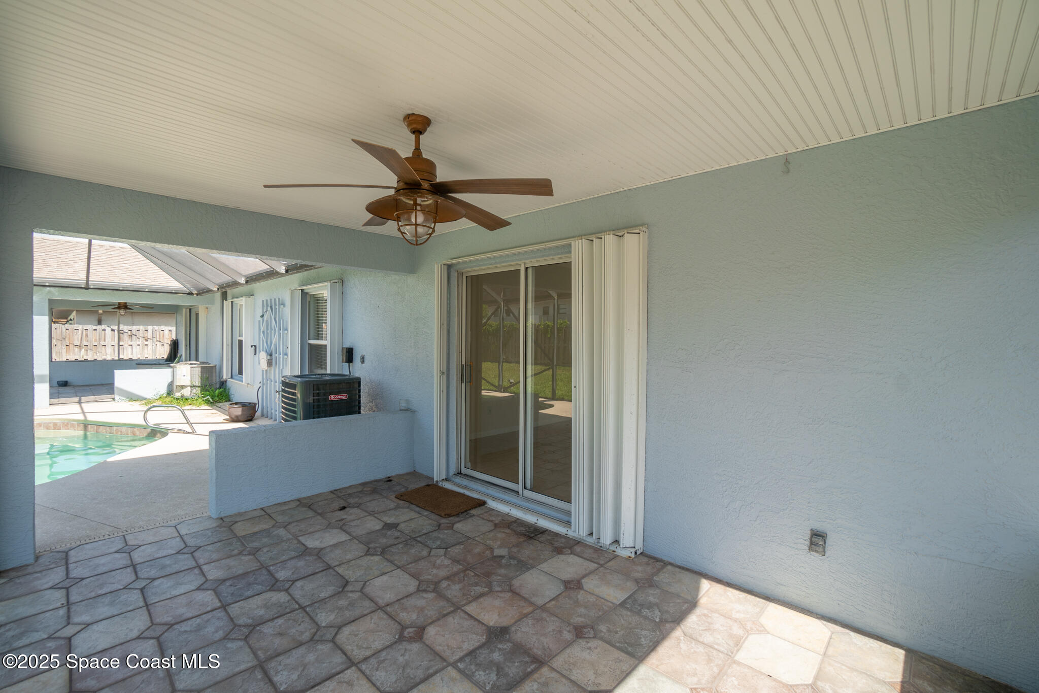147-159 Ocean View Lane Melbourne, FL 32903 - Photo 29 of 48 a view of a hallway with a chandelier