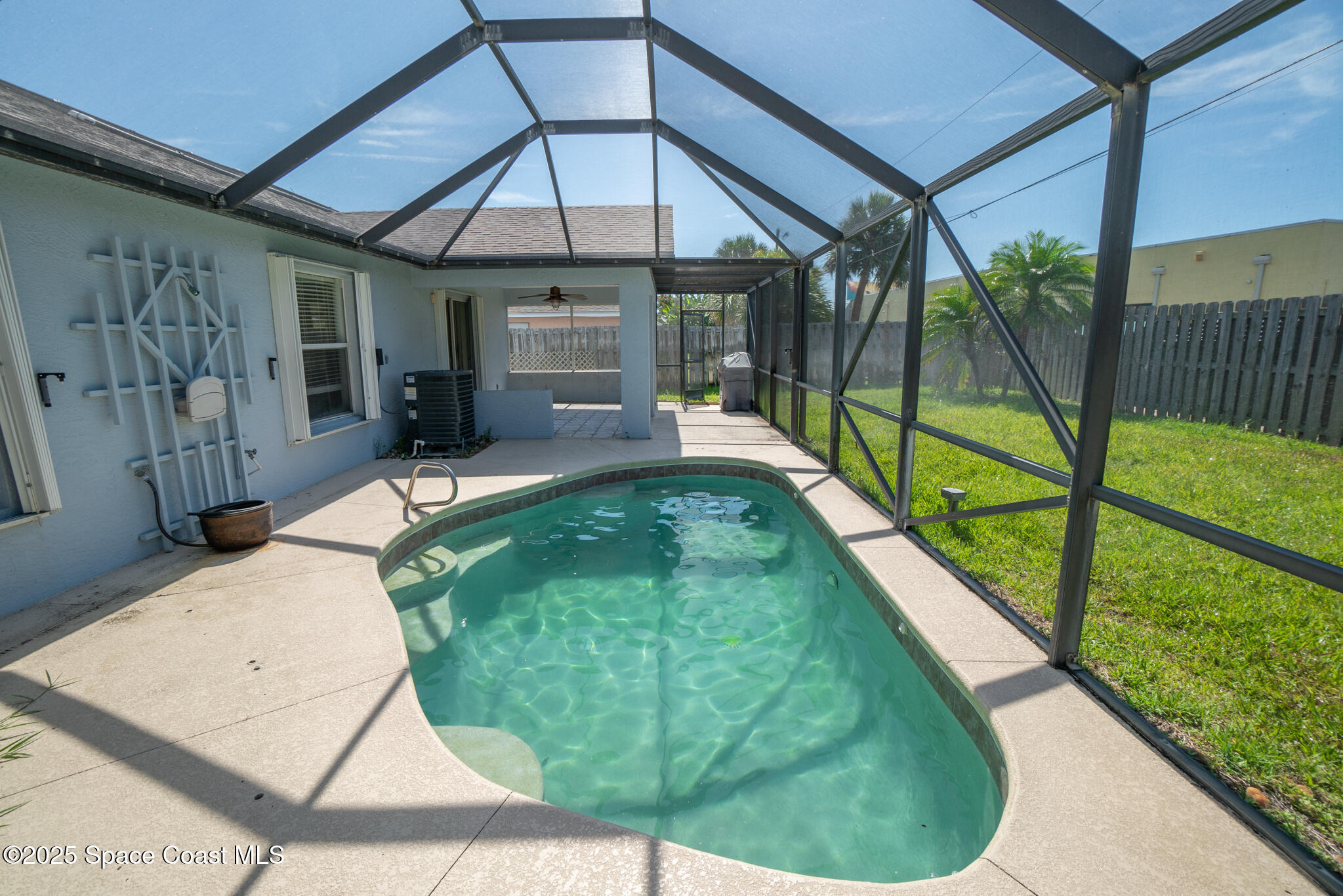 147-159 Ocean View Lane Melbourne, FL 32903 - Photo 33 of 48 a house view with a swimming pool