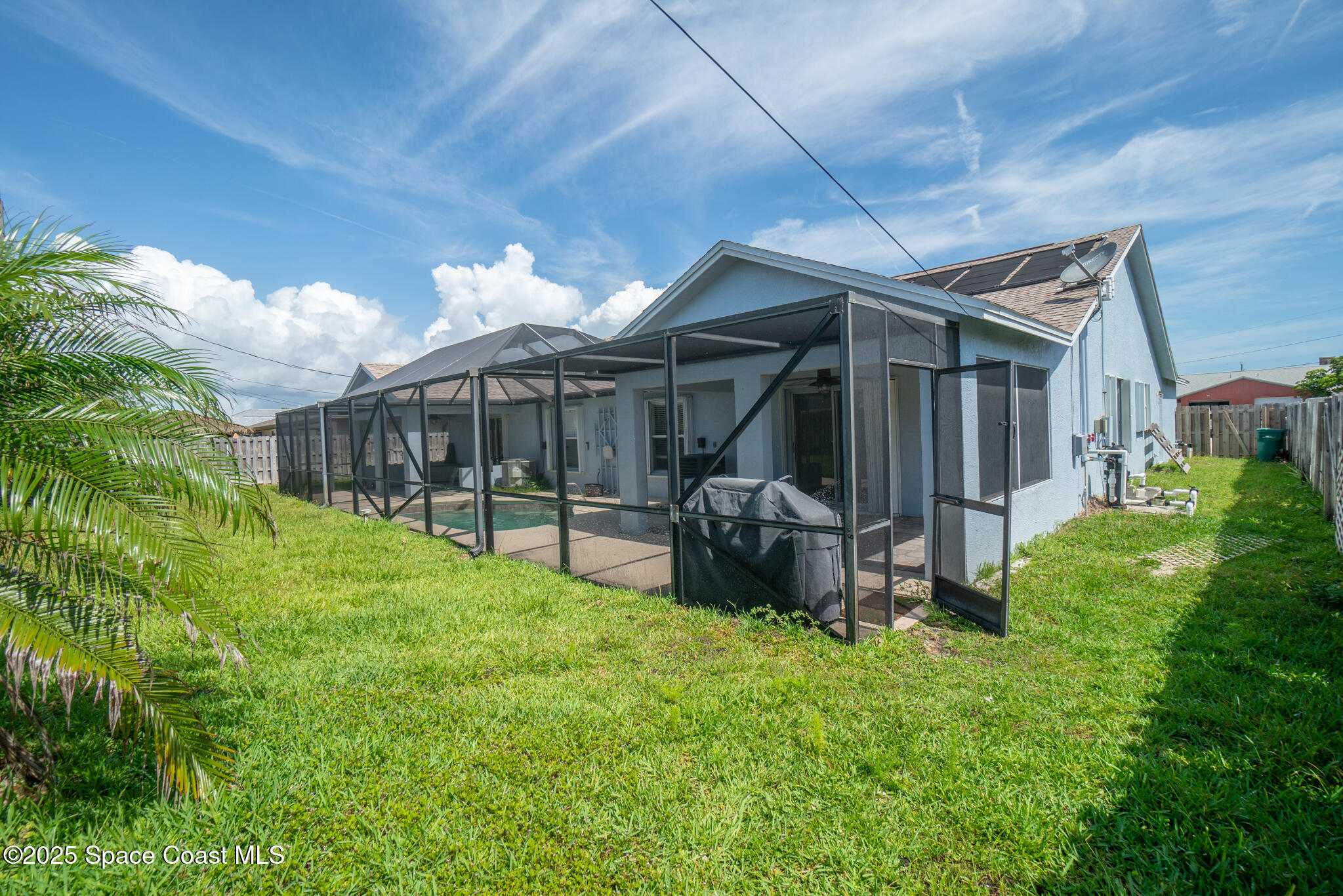 147-159 Ocean View Lane Melbourne, FL 32903 - Photo 36 of 48 a view of a house with backyard and porch