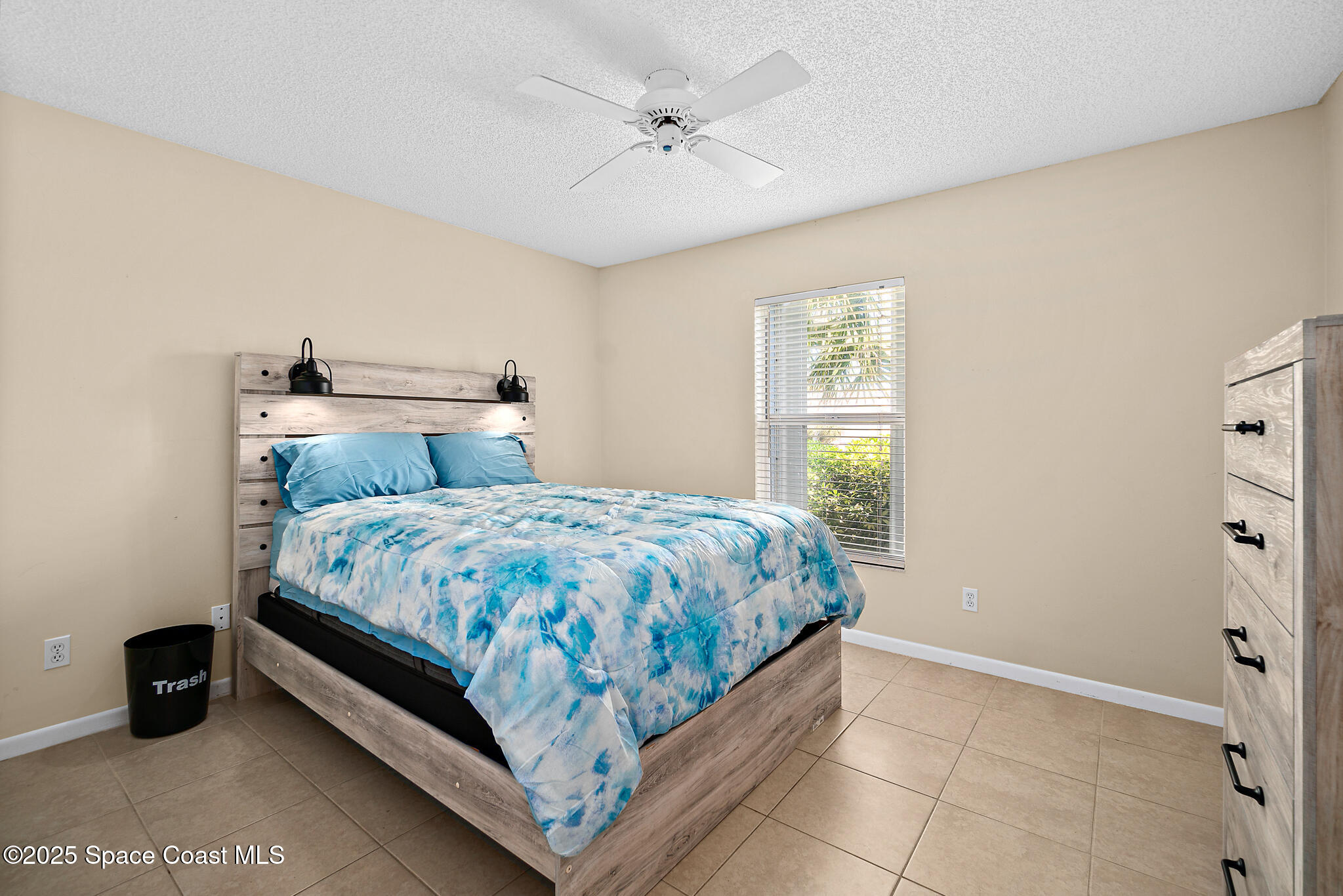 147-159 Ocean View Lane Melbourne, FL 32903 - Photo 8 of 48 a bedroom with a bed and window