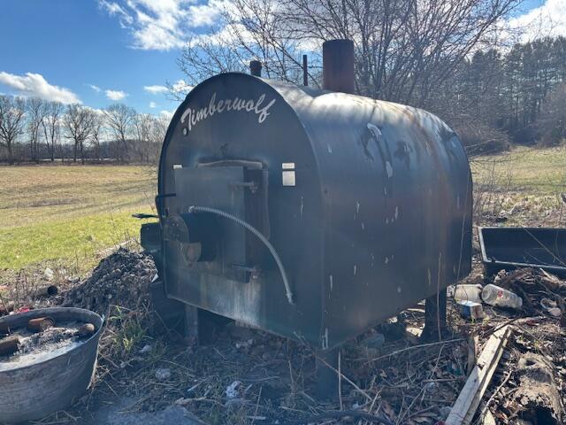 5280 Clark Lake Road Jackson, MI 49201 - Photo 9 of 12 Exterior Wood Burner
